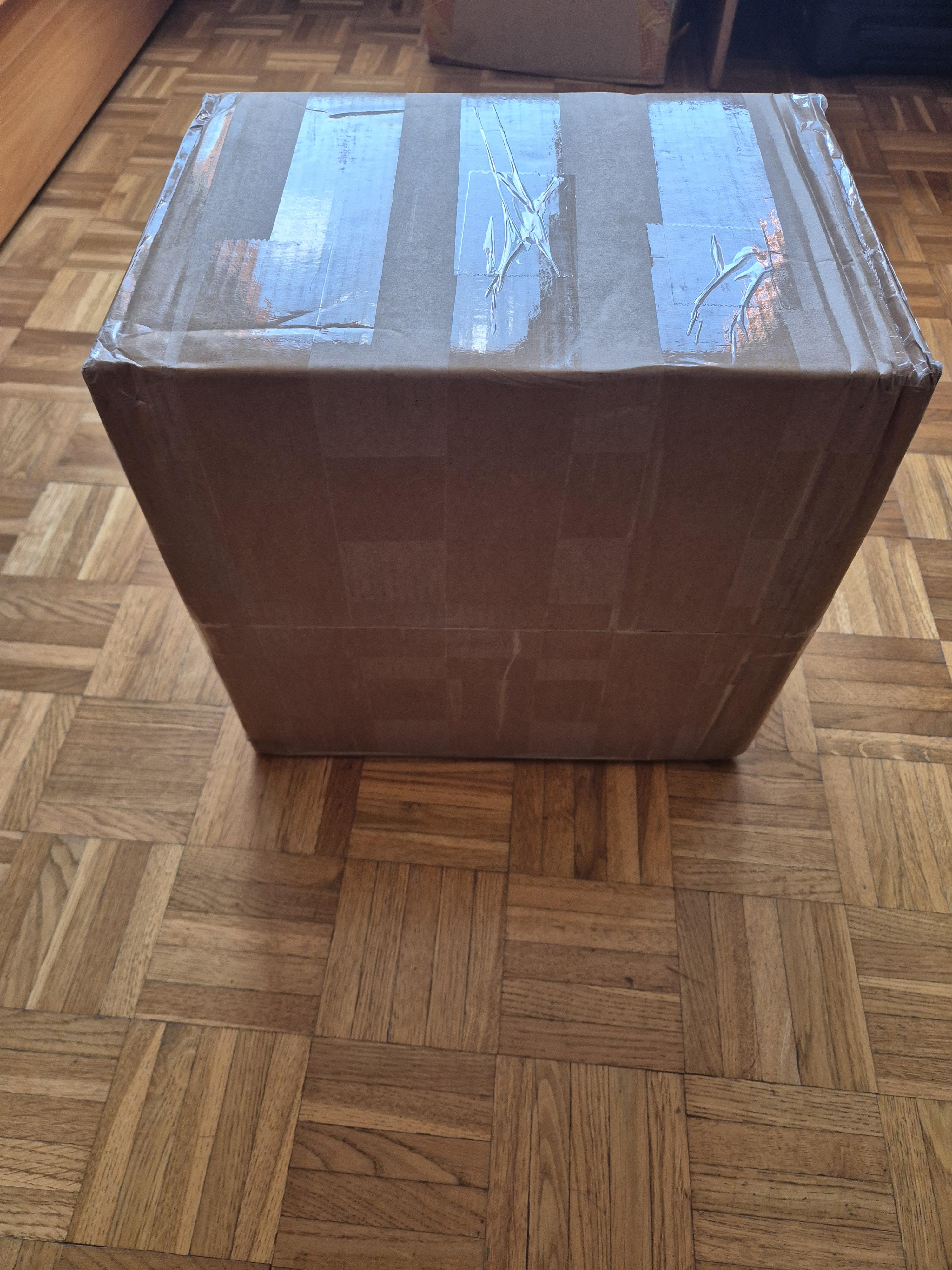 Delivered cardboard parcel shown by the Reddit author
